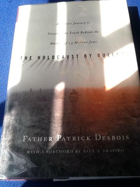 The Holocaust by Bullets A Priest's Journey to Uncover the Truth Behind the Murder of 1.5 Million Jews Hardcover Book